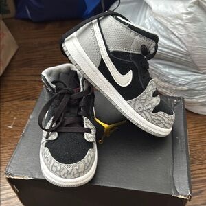 Nike Black and Gray High-Top Sneakers with Classic Design